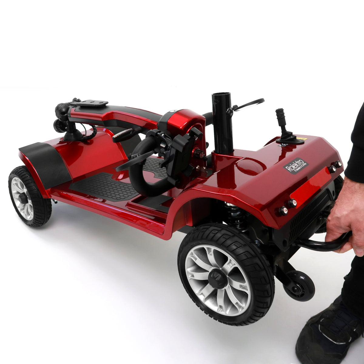 E-Quad 6 ripiegato e trasportato a mano, compatto per bagagliaio e viaggi